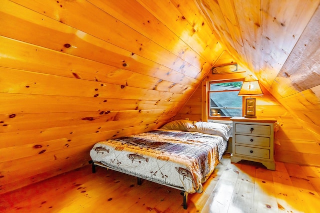 879 Amy Creek Cir, Ellijay, GA 30540 - bedroom featuring wooden ceiling, hardwood / wood-style flooring, vaulted ceiling, and wood walls