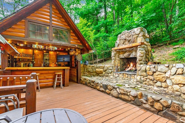 879 Amy Creek Cir, Ellijay, GA 30540 - wooden deck featuring an outdoor stone fireplace