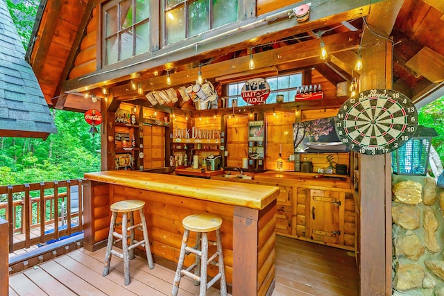879 Amy Creek Cir, Ellijay, GA 30540 - indoor bar featuring hardwood / wood-style flooring and vaulted ceiling