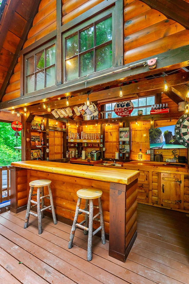 879 Amy Creek Cir, Ellijay, GA 30540 - indoor bar with wood-type flooring, plenty of natural light, and vaulted ceiling