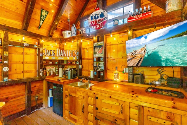 879 Amy Creek Cir, Ellijay, GA 30540 - kitchen featuring a wood ceiling with exposed beams, wood-type flooring, and high vaulted ceiling
