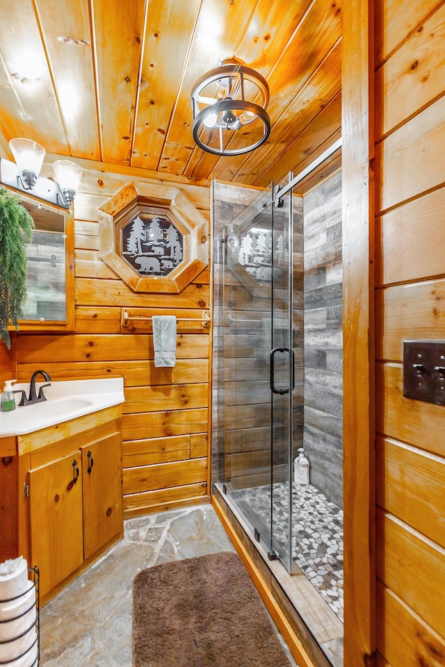 879 Amy Creek Cir, Ellijay, GA 30540 - full bathroom with wooden ceiling, vanity, a stall shower, stone finish flooring, and wooden walls