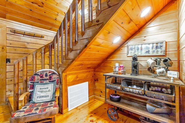 879 Amy Creek Cir, Ellijay, GA 30540 - staircase with vaulted ceiling, wood walls, hardwood / wood-style flooring, and wooden ceiling