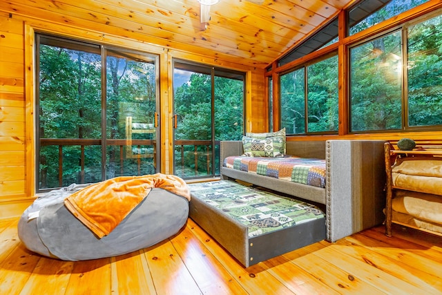 879 Amy Creek Cir, Ellijay, GA 30540 - bedroom with lofted ceiling, hardwood / wood-style floors, and multiple windows
