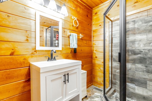879 Amy Creek Cir, Ellijay, GA 30540 - bathroom featuring vanity, a stall shower, and wood walls