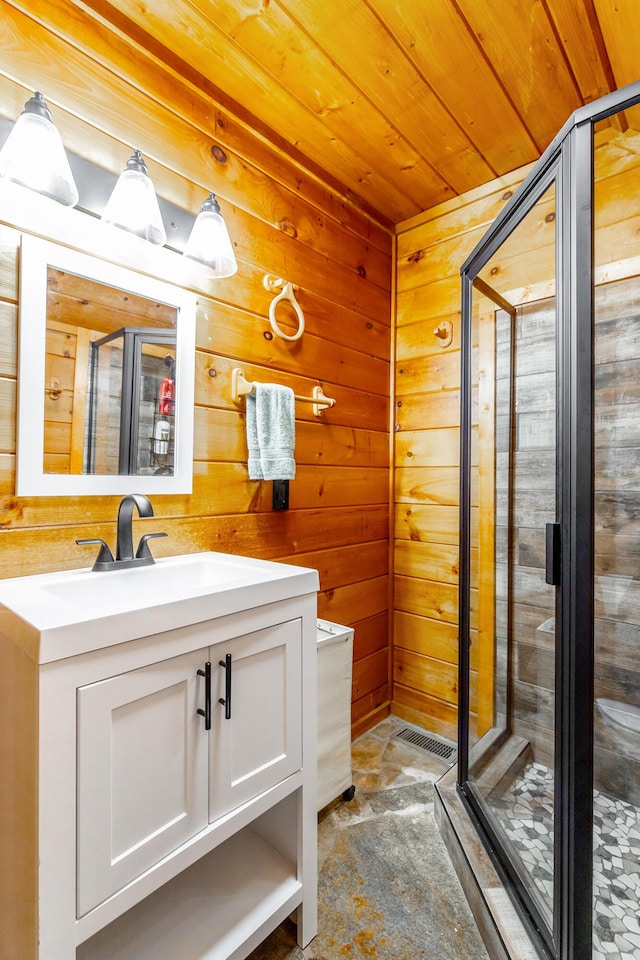 879 Amy Creek Cir, Ellijay, GA 30540 - bathroom featuring wood ceiling, wooden walls, vanity, a shower stall, and concrete floors