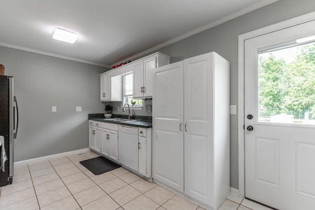 133 Wood Meadow Trl, Ringgold, GA 30736 - kitchen with white dishwasher, dark countertops, ornamental molding, freestanding refrigerator, and white cabinets