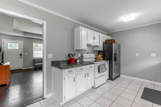 133 Wood Meadow Trl, Ringgold, GA 30736 - kitchen with white range with electric stovetop, stainless steel fridge with ice dispenser, under cabinet range hood, white cabinets, and crown molding