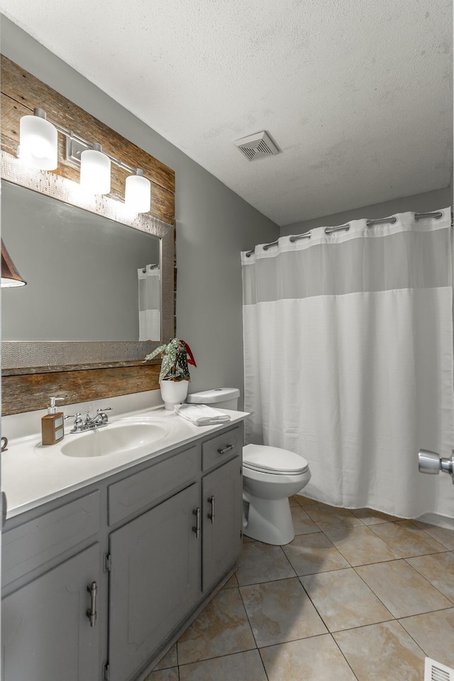133 Wood Meadow Trl, Ringgold, GA 30736 - full bathroom featuring vanity, a textured ceiling, and tile patterned flooring