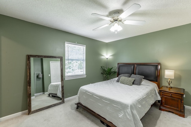 133 Wood Meadow Trl, Ringgold, GA 30736 - bedroom featuring light carpet, a ceiling fan, and a textured ceiling