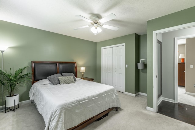 133 Wood Meadow Trl, Ringgold, GA 30736 - bedroom featuring a closet, carpet, and a ceiling fan