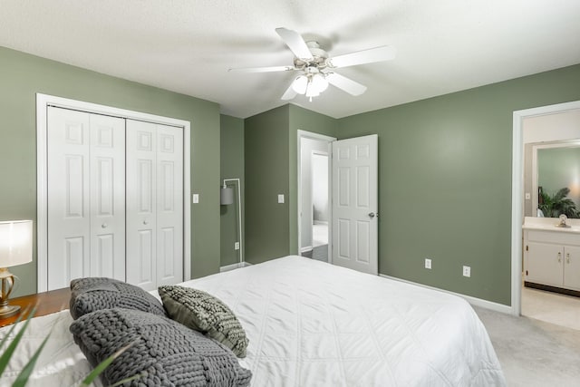 133 Wood Meadow Trl, Ringgold, GA 30736 - bedroom featuring light carpet, a closet, a ceiling fan, and connected bathroom