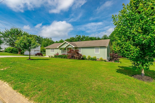 133 Wood Meadow Trl, Ringgold, GA 30736 - ranch-style home featuring a front yard, a garage, driveway, and an outdoor structure