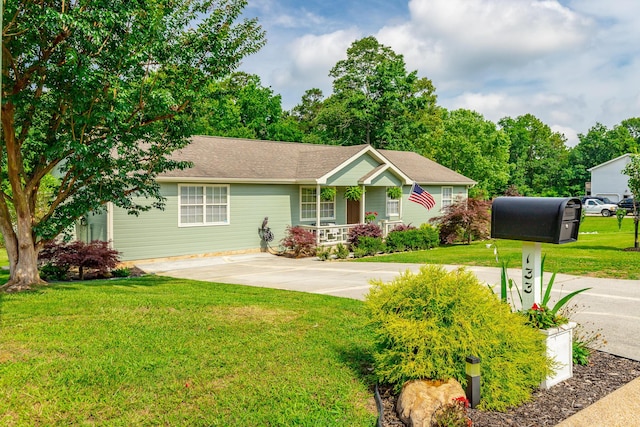 133 Wood Meadow Trl, Ringgold, GA 30736 - ranch-style home featuring a front yard and covered porch