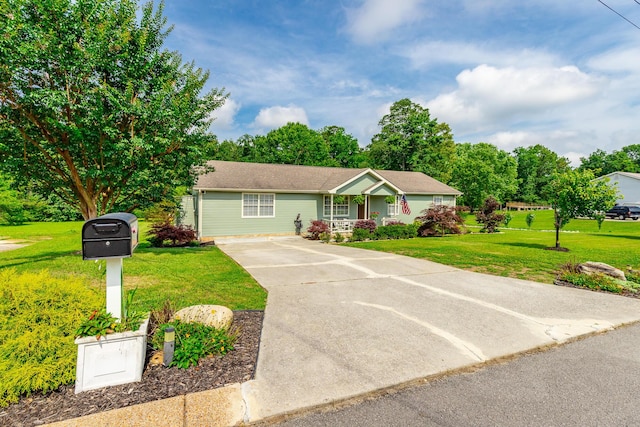 133 Wood Meadow Trl, Ringgold, GA 30736 - single story home with concrete driveway, covered porch, and a front yard