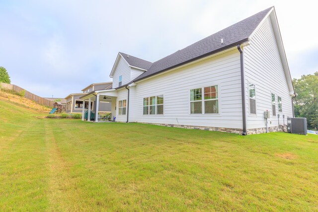 905 Live Oak Rd, Ringgold, GA 30736 - back of property with a playground, a lawn, and a ceiling fan