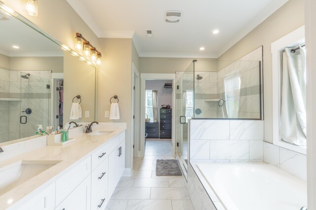 905 Live Oak Rd, Ringgold, GA 30736 - bathroom featuring double vanity, a shower stall, a spacious closet, a garden tub, and ornamental molding