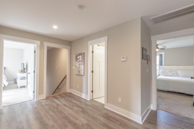 905 Live Oak Rd, Ringgold, GA 30736 - hall featuring wood finished floors, an upstairs landing, and recessed lighting