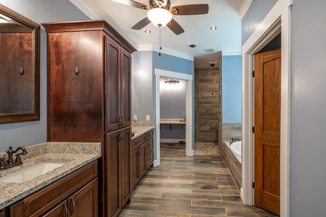 343 Highlands Forest Rd, Menlo, GA 30731 - bathroom featuring crown molding, ceiling fan, vanity, a bath, and wood finished floors