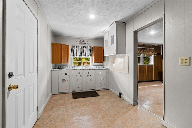 1815 City View St, Dalton, GA 30720 - kitchen with light countertops and brown cabinetry