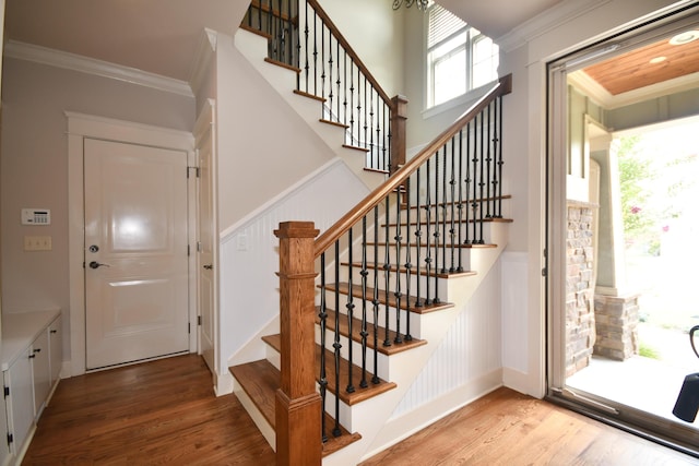 9532 Wandering Way, Ooltewah, TN 37363 - stairway with wood finished floors, crown molding, wainscoting, and a decorative wall
