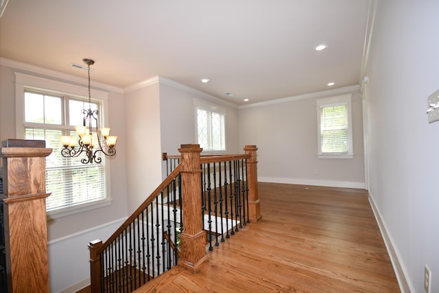 9532 Wandering Way, Ooltewah, TN 37363 - stairway with a chandelier, wood finished floors, crown molding, and recessed lighting