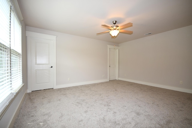 9532 Wandering Way, Ooltewah, TN 37363 - unfurnished room featuring healthy amount of natural light, carpet flooring, and a ceiling fan
