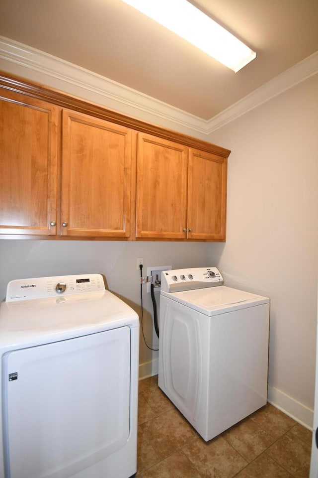 9532 Wandering Way, Ooltewah, TN 37363 - laundry room featuring cabinet space, washing machine and dryer, and ornamental molding