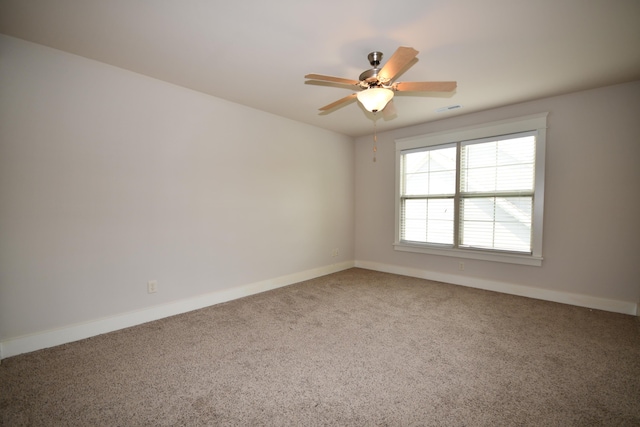 9532 Wandering Way, Ooltewah, TN 37363 - carpeted spare room with baseboards and a ceiling fan