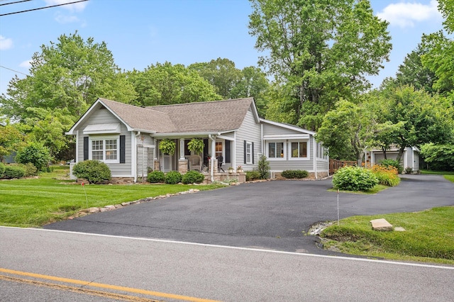 3412 Fairmount Pike, Signal Mountain, TN 37377 - ranch-style house with a porch, a front yard, and roof with shingles