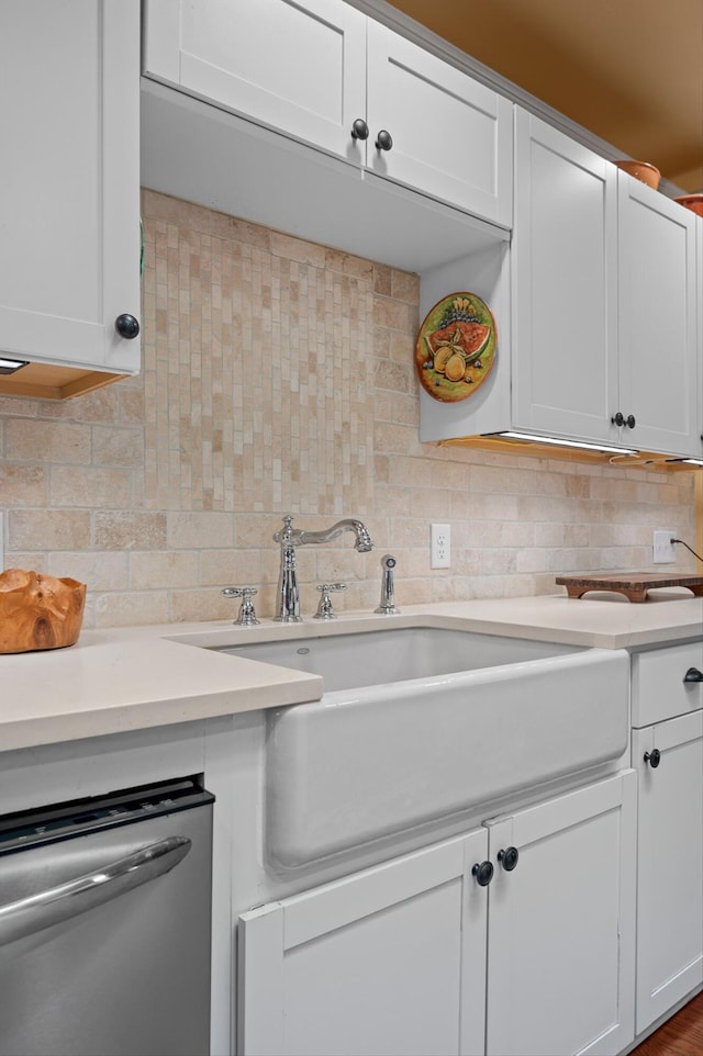 3412 Fairmount Pike, Signal Mountain, TN 37377 - kitchen with stainless steel dishwasher, light countertops, decorative backsplash, and white cabinetry
