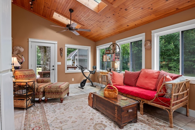 3412 Fairmount Pike, Signal Mountain, TN 37377 - tiled living room with a skylight, plenty of natural light, wooden ceiling, vaulted ceiling, and ceiling fan