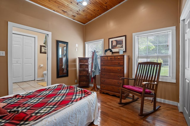 3412 Fairmount Pike, Signal Mountain, TN 37377 - bedroom with wooden ceiling, light wood finished floors, connected bathroom, and high vaulted ceiling