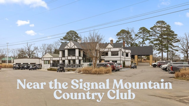 3412 Fairmount Pike, Signal Mountain, TN 37377 - view of front facade with uncovered parking and a chimney