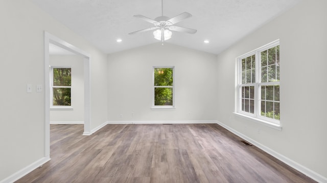 607 Gregory Ln, Lafayette, GA 30728 - unfurnished room featuring plenty of natural light, lofted ceiling, dark wood-style floors, and ceiling fan
