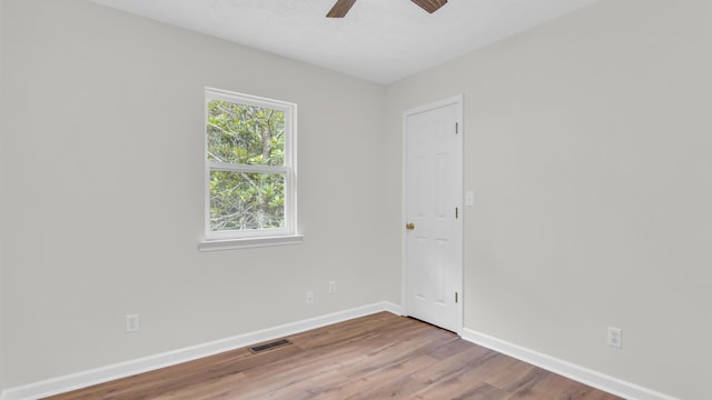 607 Gregory Ln, Lafayette, GA 30728 - empty room with a ceiling fan and wood finished floors