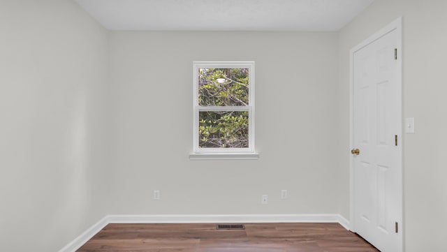 607 Gregory Ln, Lafayette, GA 30728 - spare room with dark wood-type flooring