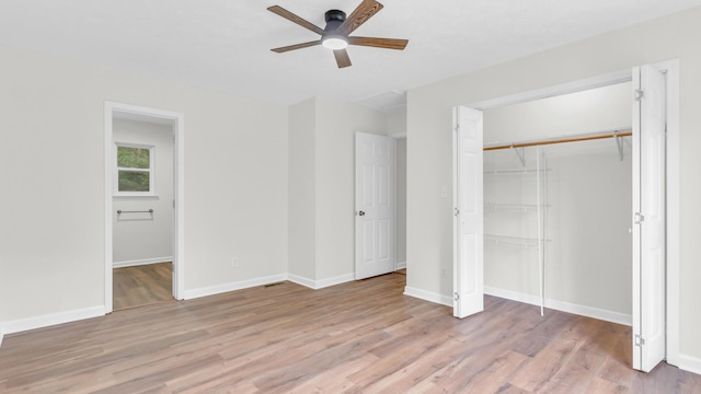 607 Gregory Ln, Lafayette, GA 30728 - unfurnished bedroom with light wood-style flooring, a closet, connected bathroom, and a ceiling fan