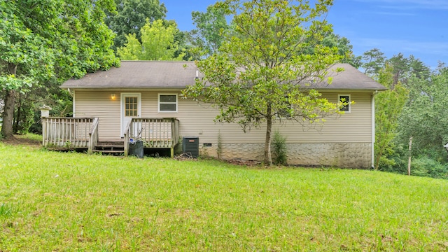 607 Gregory Ln, Lafayette, GA 30728 - back of property featuring a deck and a lawn