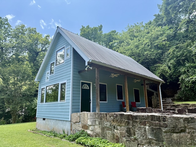 4019 W Rd, Signal Mountain, TN 37377 - view of front of home featuring ceiling fan, a metal roof, covered porch, a front yard, and crawl space