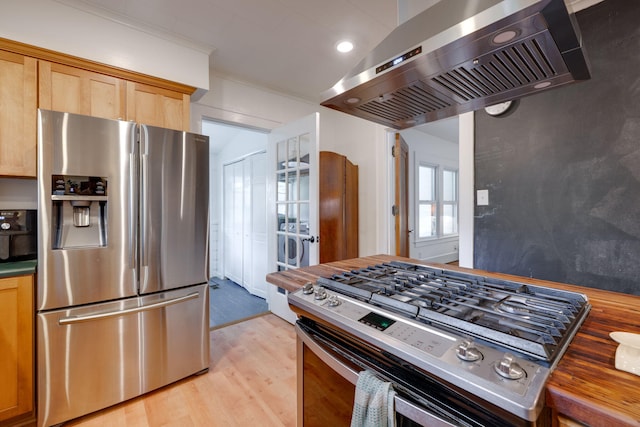 511 Georgia Ave, Signal Mountain, TN 37377 - kitchen with appliances with stainless steel finishes, wall chimney exhaust hood, light wood finished floors, and recessed lighting