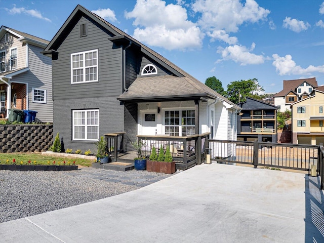 332 Oliver St, Chattanooga, TN 37405 - view of front of home featuring brick siding and covered porch