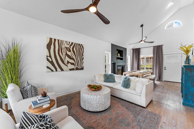 332 Oliver St, Chattanooga, TN 37405 - living room with ceiling fan, high vaulted ceiling, a fireplace, and wood finished floors