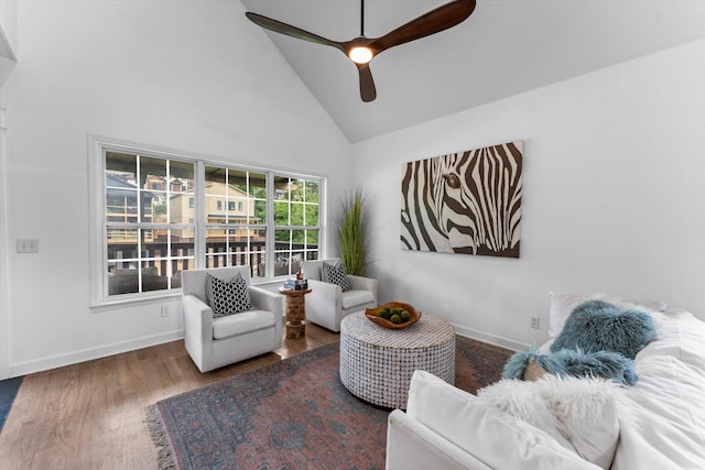 332 Oliver St, Chattanooga, TN 37405 - sitting room with wood finished floors, ceiling fan, and high vaulted ceiling