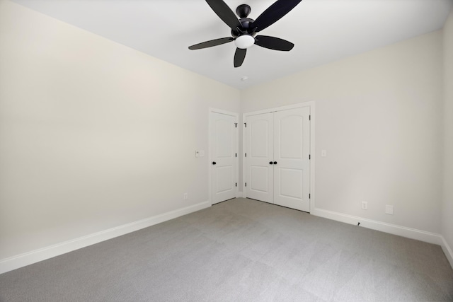 10822 Dallas Hollow Rd, Soddy Daisy, TN 37379 - unfurnished bedroom with light colored carpet, a closet, and a ceiling fan