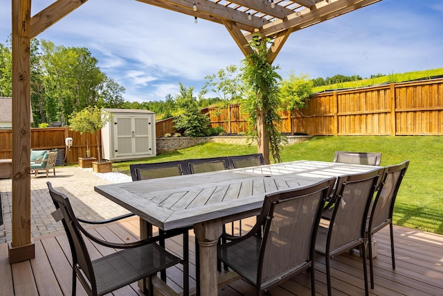 10607 Flicker Way, Apison, TN 37302 - deck with outdoor dining area, a storage shed, a pergola, a fenced backyard, and a patio area