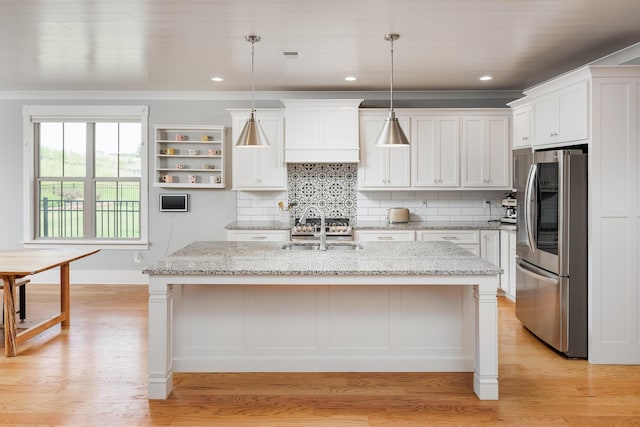 10607 Flicker Way, Apison, TN 37302 - kitchen with smart refrigerator, white cabinets, backsplash, a center island with sink, and ornamental molding