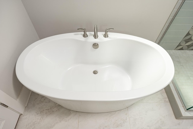 10607 Flicker Way, Apison, TN 37302 - bathroom with a freestanding tub