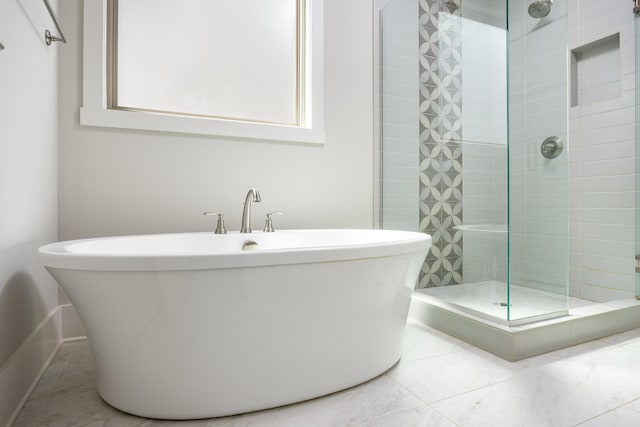 10607 Flicker Way, Apison, TN 37302 - bathroom featuring a shower stall and a soaking tub