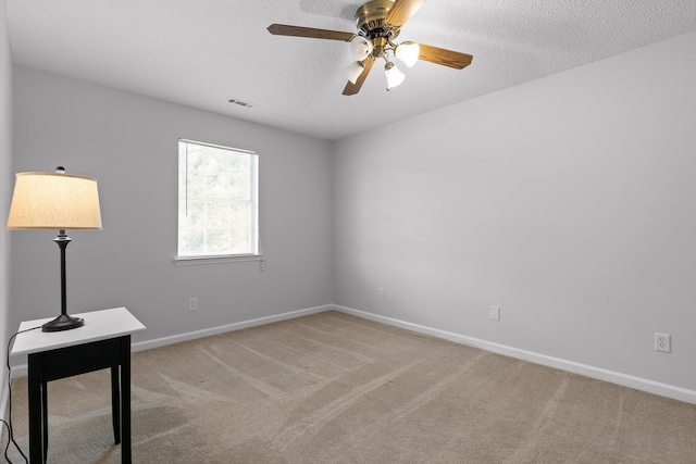 8616 Oak View Dr, Chattanooga, TN 37421 - empty room with light carpet, ceiling fan, and a textured ceiling